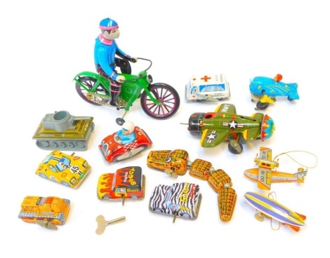 A group of Japanese and Chinese clockwork tinplate toys, to include aeroplane, man on bicycle, racing car, snake, tank, etc. (1 tray)