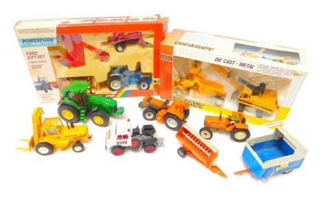 A Britain's Power Farm cased set, tipping trailer, John Deere tractor, Sanderson forklift, and a Joal diecast compact crane, boxed. (1 tray and 1 item)