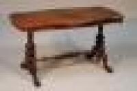 A mid Victorian walnut veneered centre table
