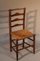 A Lincolnshire style ladder back chair.