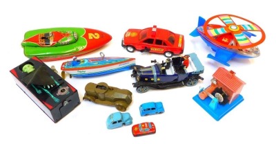 Japanese and Chinese tinplate clockwork toys, to include speedboat, space station, fire truck, water mill, coffin bank, etc. (1 box)