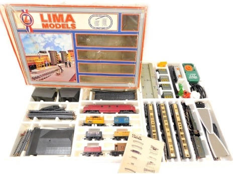 A Great Western OO gauge cased train set, comprising King George V locomotive and tender, coaches, track, etc. (boxed)