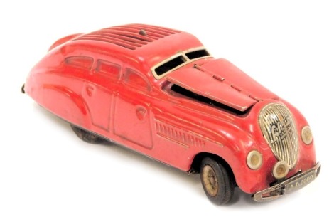 A Schuco Commando Anno 2000 tinplate clockwork car.