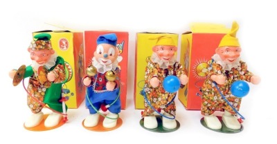 Sonni Toy pump operated clowns, including 4033 Clown with Ball, 4032 Clown with cymbals, and 4017 Clown with Bells, boxed. (4)