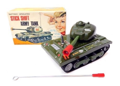 A TN Nomura tinplate battery operated stick shift army tank, boxed.