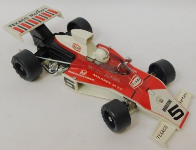 An Alps battery powered Formula 1 racing car Texaco Malboro, boxed. - 2