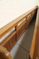 A 19thC pitch pine church pew frontal with prayer book rack