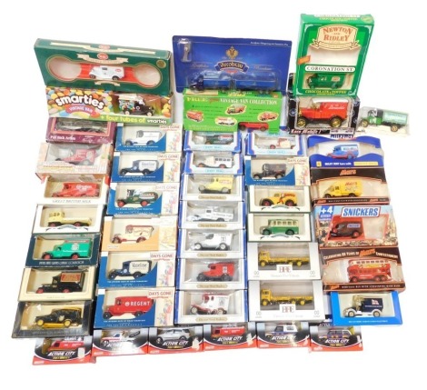 Lledo Days Gone EFE and other diecast vehicles, including 1928 Chevrolet box van Madame Tussauds, Days Gone van guards 1950 Bedford 30CWT Canadia Dry Ginger Ale, EFE 10703 Wimpy flat bed truck, four wheel flat bed Paul Brothers, etc., boxed. (1 box)