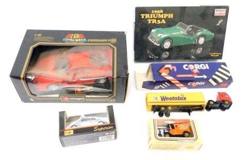 A Burago diecast Ferrari F40 1987, boxed, Minicraft model kit 1958 Triumph TR3A, Days Gone by Lledo model truck, Corgi Volvo container truck, and a Maisto Superior Beetle, boxed. (5)