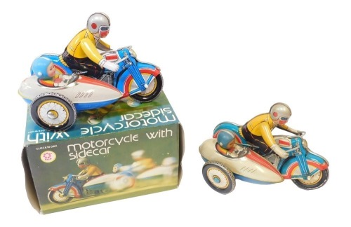 A Collectable Kits clockwork tinplate motorcycle with sidecar, MS709, boxed, with key, and another. (2)