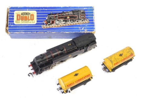 A Hornby Dublo OO gauge tank locomotive BR, 2-6-4, boxed, and two tinplate shell lubricants Hornby Dublo wagons. (3)