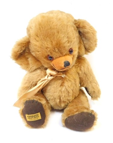 A Merry Thought blonde plush jointed Teddy bear, with amber eyes.