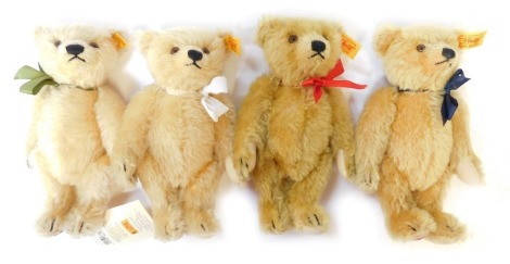 A Steiff plush blonde jointed British Isles Teddy bear, comprising England, Wales, Scotland and Ireland, each with coloured bow, tags and labels, 19cm high. (4)