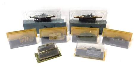 Diecast armored vehicles, comprising two Atlas Edition Naval ships, an Amer M35A1 armored vehicle, and five model tanks, comprising the M1A1HA Abrams Iraq 2003, the VI Tiger Ausf.E Germany 1943, the M4A3 Sherman France 1945, Challenger UK mainland divisio