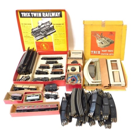 OO gauge railway, comprising a Tricks twin railway, comprising set with wagons, shell and a 63950 and 84 Locos, twin packs station, various track etc., partially boxed. (1 box)