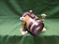 A pair of Victorian brass candlesticks and a small oak cask