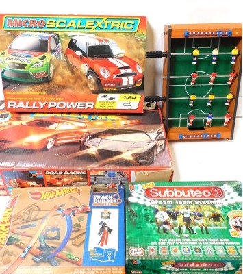 Various toys and games, comprising a Scalextric Road Racing C770 set, Subbuteo Dream Team Stadium box lid, Scalextric Ralley Power, Hot Wheels track, and table football. (5)