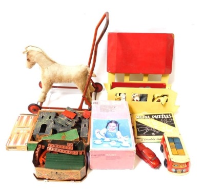 Toys and games, comprising push along horse, tea set, wooden Noah's Arc and various animals, fort, etc. (1 box)