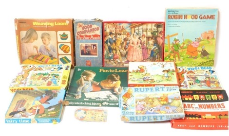 Jigsaws and board games, comprising Waddington's Walt Disney Robin Hood game, Leisure Hour, Rupert Bear Jigsaws, Yogi Bear Jigsaws, etc. (1 box)