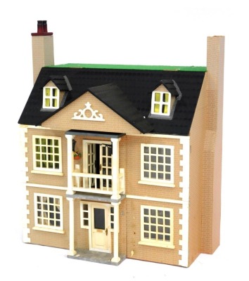 A Tudor style three storey wooden doll's house, with brick laid detail, and a slatted roof, 78cm high, 70cm wide, 39cm deep. (AF)