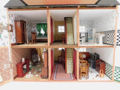 A Tudor style three storey wooden doll's house, with brick laid detail, and a slatted roof, 78cm high, 70cm wide, 39cm deep. (AF) - 4