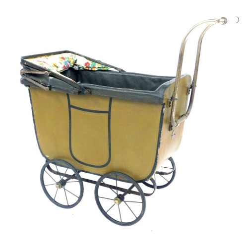 A 1950s Triangtois (Line Bros ltd) doll's pram, with a brown painted base, and floral hood, 66cm high, 68cm wide.