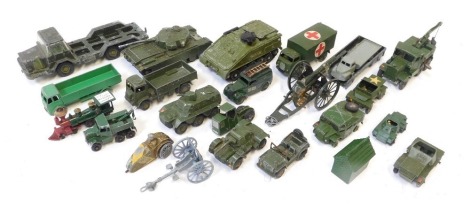 A group of Corgi and Dinky diecast armoured vehicles, playworn, to include tanks, cannons, trucks, etc. (1 tray)