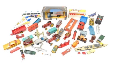 A group of diecast playworn vehicles, to include Corgi, Dinky and others, racing car, tractor, bus, etc. (1 box)