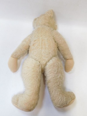 A 1940s plush blonde jointed Teddy bear, in light coloured fur, with wire wool filling, 63cm high. - 2