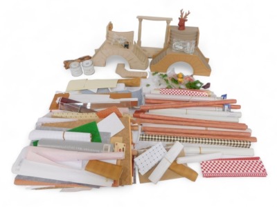 A collection of doll's house accessories, comprising grand entrance steps, materials, rods, etc. (2 boxes)