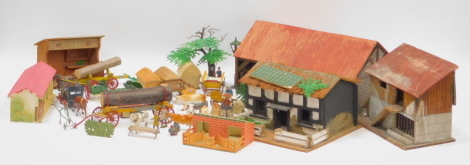 Britains farmyard buildings and figures, including cows, horse and carts, farmers, scenics, etc. (2 boxes)