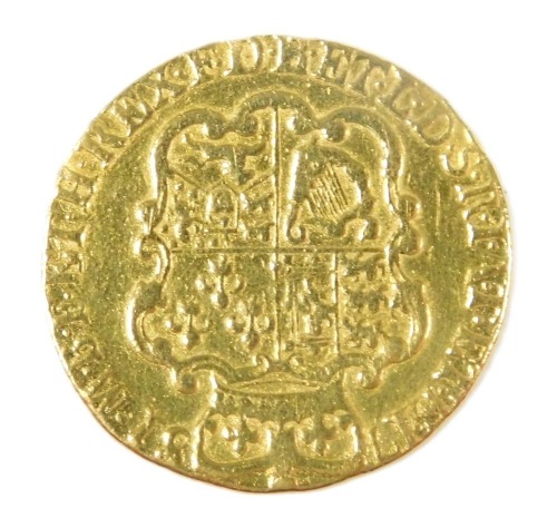 A George II gold guinea 1781, the obverse with laureate head, reversed with crowned shield of arms, approximately 8.2g.