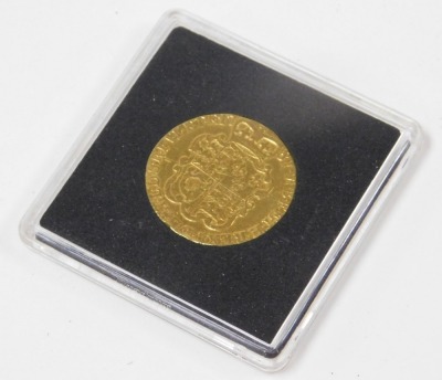 A George II gold guinea 1781, the obverse with laureate head, reversed with crowned shield of arms, approximately 8.2g. - 3