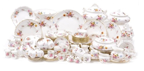 A Royal Crown Derby porcelain Derby Posies pattern dinner tea and coffee service, including a soup tureen and cover, three vegetable tureens and covers, nine dinner, ten dessert and thirteen soup plates, circular meat platter, pair of serving dishes, crea