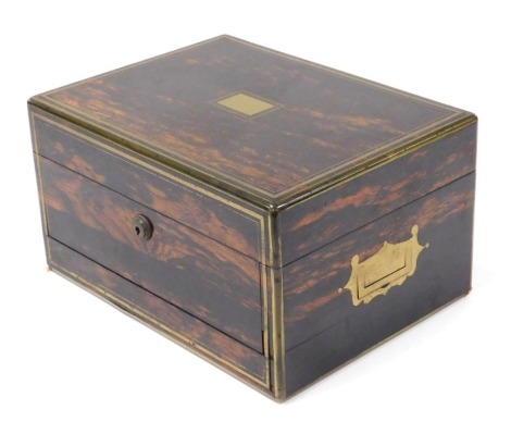 A Victorian coromandel and brass bound writing box, the lock plate stamped S Morden and Company, the hinged lid opening to reveal a purple Morocco bound fitted interior, 31cm wide, 23cm deep.