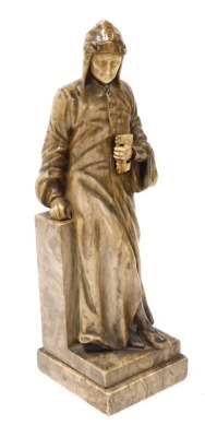 A 19thC alabaster figure of Dante Alighieri, modelled standing, leaning against a plinth, with a book in his hand, raised on stepped square base, 43.5cm high.