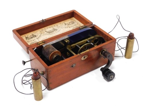 A Victorian improved patent Magneto-Electric machine, for the treatment of nervous diseases, mahogany cased, 26cm wide.