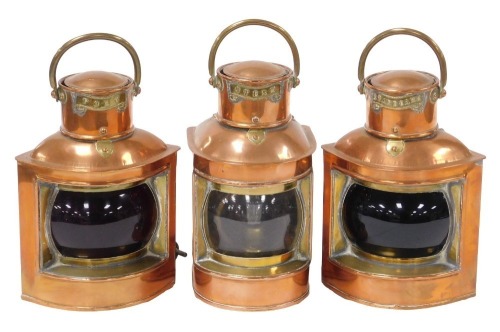 Three copper and brass ship's lights, converted to electricity, comprising port, starboard and stern lights, 21cm high.