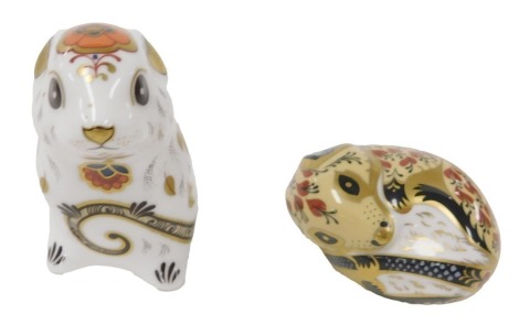 A Royal Crown Derby Imari porcelain paperweight, modelled as a mouse, circa 2005, gold button, together with a paperweight modelled as a sleeping dormouse, silver stopper. (2)