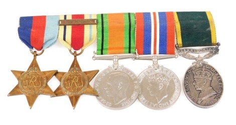 A WWII group of medals, comprising Territorial Efficiency medal, named to GNR A E Webb R.A, 1450220, 1939-1945 Star, Africa Star with 8th Army clasp, Defence medal and 1939-1945 medal.