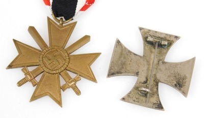 A WWI German Iron Cross First Class 1914, together with a WWII German War Merit cross. (2) - 2