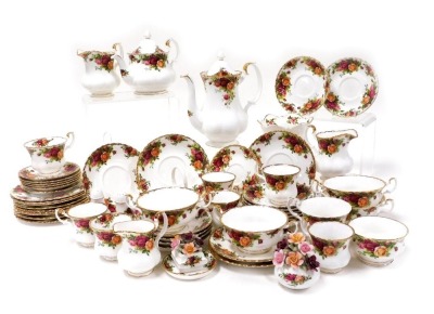 A group of Royal Albert porcelain Old Country Roses pattern tablewares and ornaments, including a tea and coffee pot, soup cups and saucers, tea and coffee cups, jardiniere, floral ornaments etc. (AF)