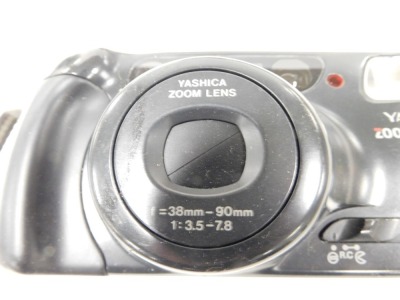 A Yashica Zoomtec 90 Super camera, Olympus Zoom AF AZ-330 camera, Miranda 24mm F2.8MC lens, and other camera accessories. (qty) - 3