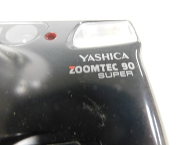 A Yashica Zoomtec 90 Super camera, Olympus Zoom AF AZ-330 camera, Miranda 24mm F2.8MC lens, and other camera accessories. (qty) - 4