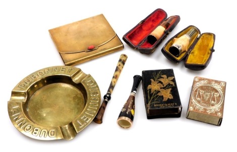 Assorted smoking memorabilia, including a Dubonet advertising brass ashtray, Bryant and May's metal match sleeve, Art Deco brass cigarette case with a Cabersham button, faux tortoiseshell cigarette holder and a meerschaum and plate mounted cheroot holder.