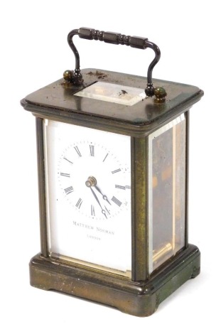 A Matthew Norman of London brass case carriage clock, rectangular dial bearing Roman numerals, single barrel Swiss movement, the case of conventional form, key lacking, 12.5cm high.