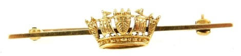 A naval crown bar brooch, stamped 14ct, in a box for the Goldsmiths and Silversmiths Company Ltd, 112 Regent Street London, 3.3g.