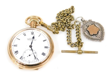 An early 20thC gold plated gentleman's pocket watch, for Judges Krectime, A Lester, open face, keyless wind, circular enamel dial bearing Roman numerals, subsidiary seconds dial, in a plain case, on a curb link Albert chain, with silver gilt fob medallion