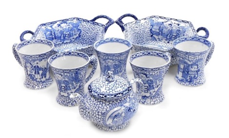 A pair of early 20thC Adams blue and white pottery baskets, chinoiserie decorated, printed marks, 26cm wide, together with a teapot and five mugs.