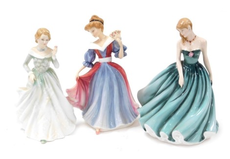 Three Royal Doulton porcelain figures, comprising Sarah HN3978, Amy, figure of the year, HN3316 and Grace HN3699.